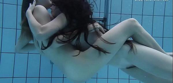  Two hot lesbians in the pool loving eachother